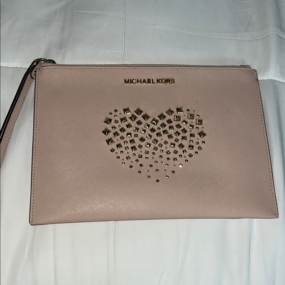 Michael Kors Handbags - Michael Kors Pink Wristlet with Gold Heart Design
